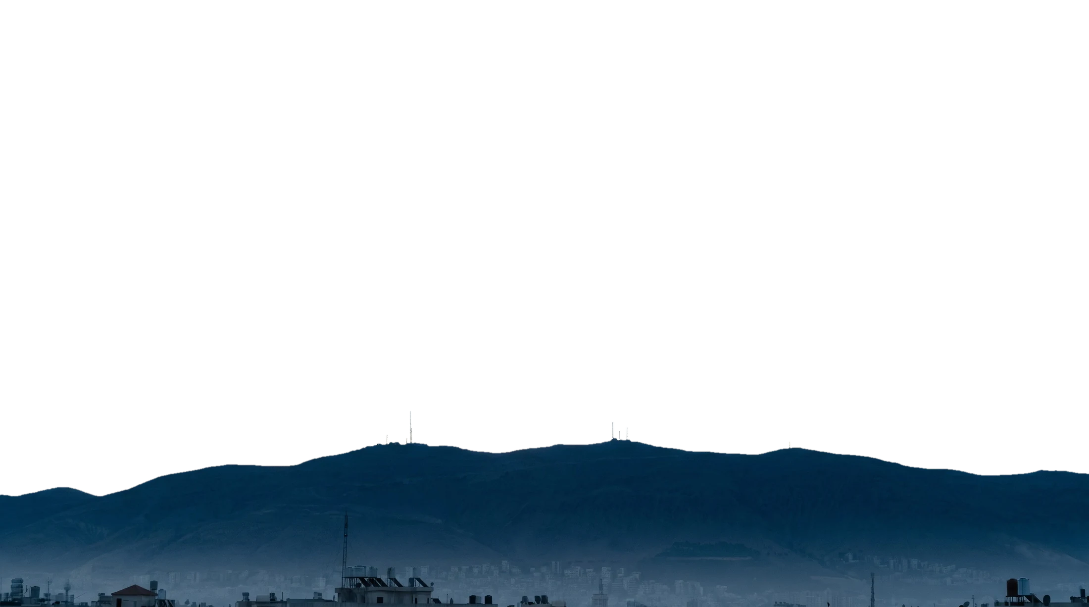 Mount Qasioun at dawn under a halo of light